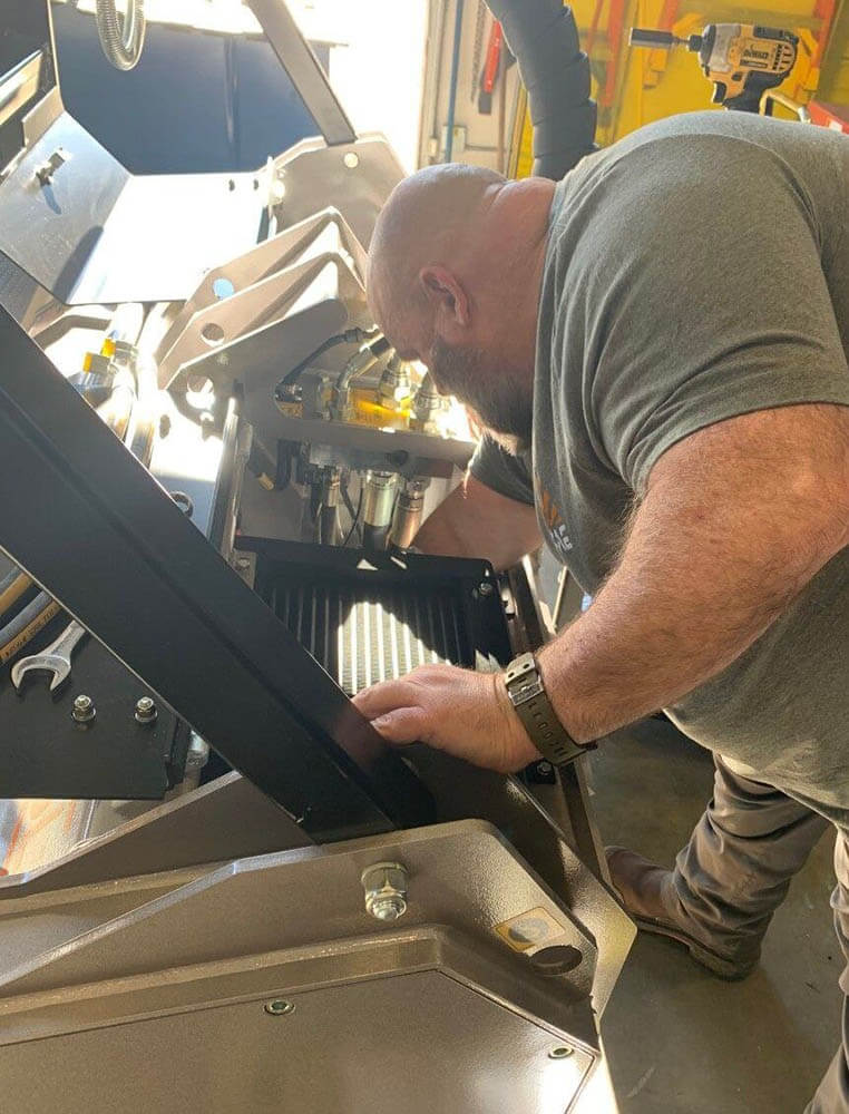 Employee working on equipment
