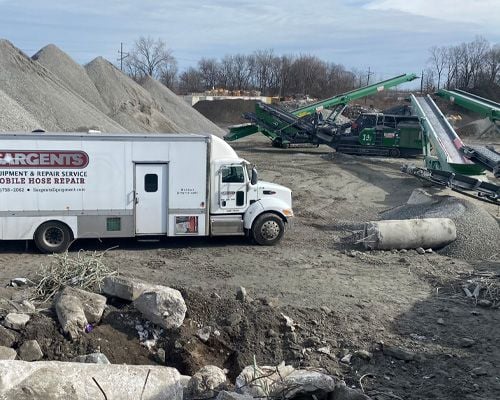mobile hose repair truck front view on job site